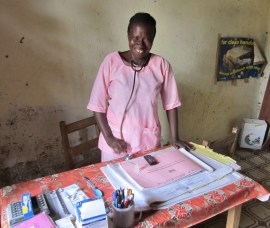 Nurse Adama is happy she safely delivered another baby at the village health clinic.