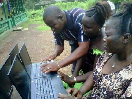 CCET teacher instructs adult students.