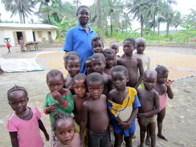 Chief Caulker with village children.