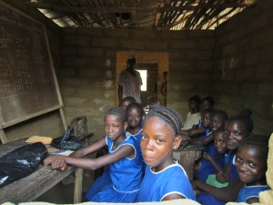 Primary school in Moyeamoh.  All but one of this sixth grade class are girls.