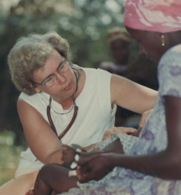 Winifred examining patient, Manjama, Sierra Leone